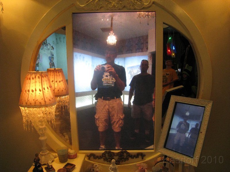 Disneyland 2010 Park 0225.JPG - The digital mirror... a camera on the left picks up image and displays in the big screen. This was about .5 seconds before Dad and the kids pushed in front of me.